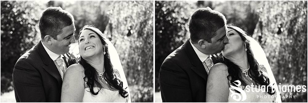 Creative portraits of the bride and groom at the lakeside at Calderfields in Walsall by Documentary Wedding Photographer Stuart James