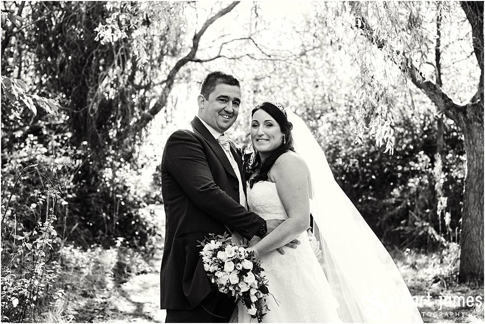 Utilising the stunning grounds for beautiful portraits of the bride and groom at Calderfields in Walsall by Documentary Wedding Photographer Stuart James