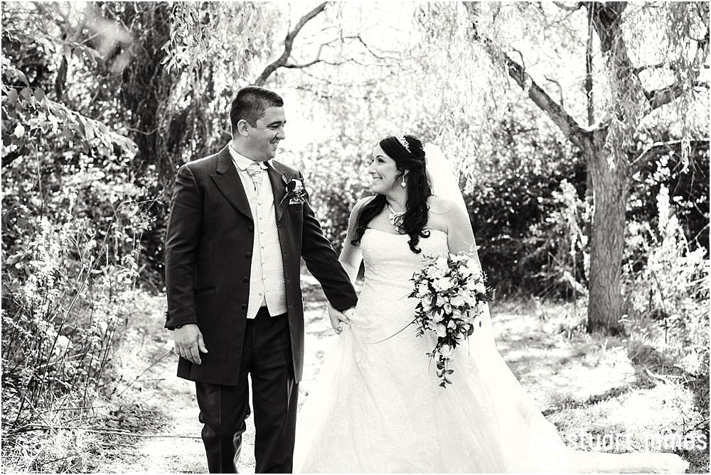 Utilising the stunning grounds for beautiful portraits of the bride and groom at Calderfields in Walsall by Documentary Wedding Photographer Stuart James