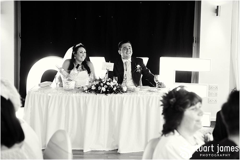 Capturing the guests relaxed and enjoying the wedding breakfast with creative candid photographs by Documentary Wedding Photographer Stuart James