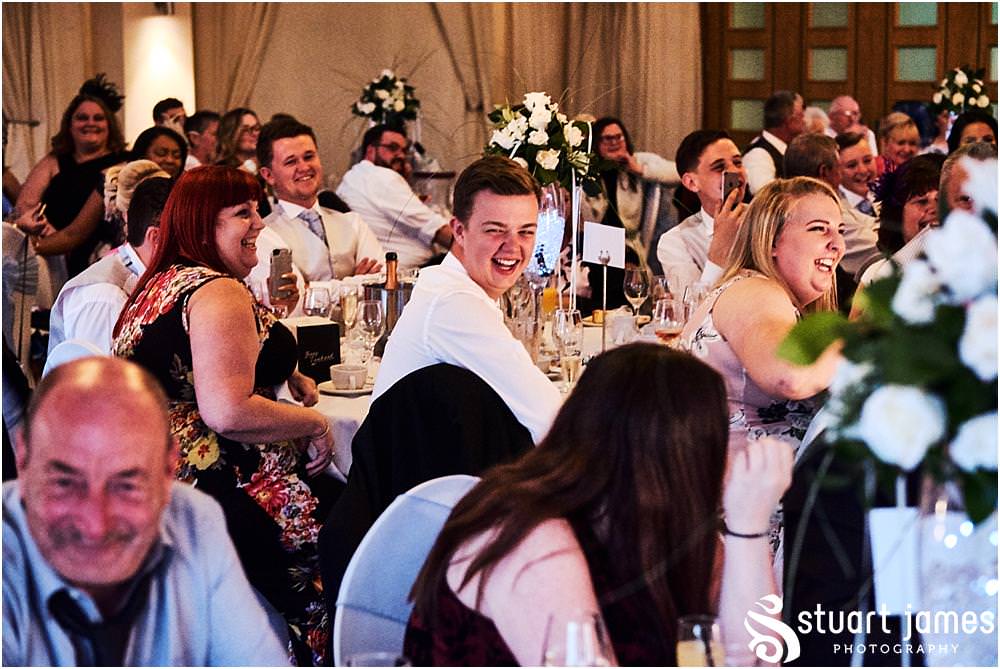 Creating timeless photographs of the wedding speeches and the emotion reactions at Calderfields by Documentary Wedding Photographer Stuart James