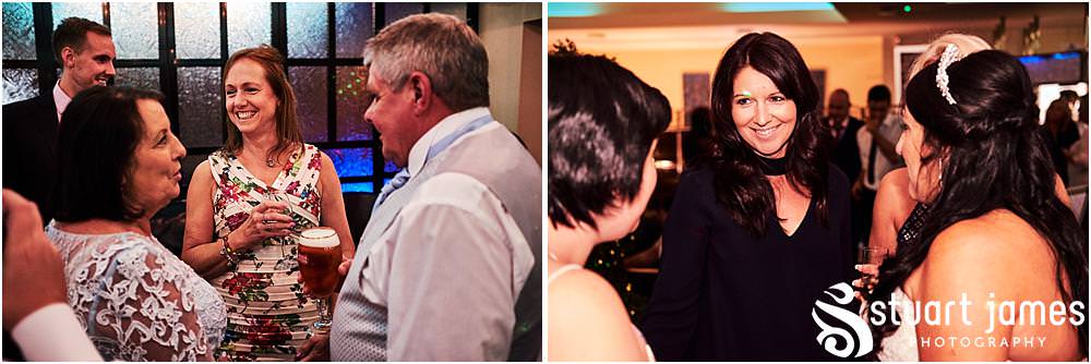 Candid photographs capturing the spirit and fun of the evening reception as the guests enjoy the fabulous wedding at Calderfields by Documentary Wedding Photographer Stuart James
