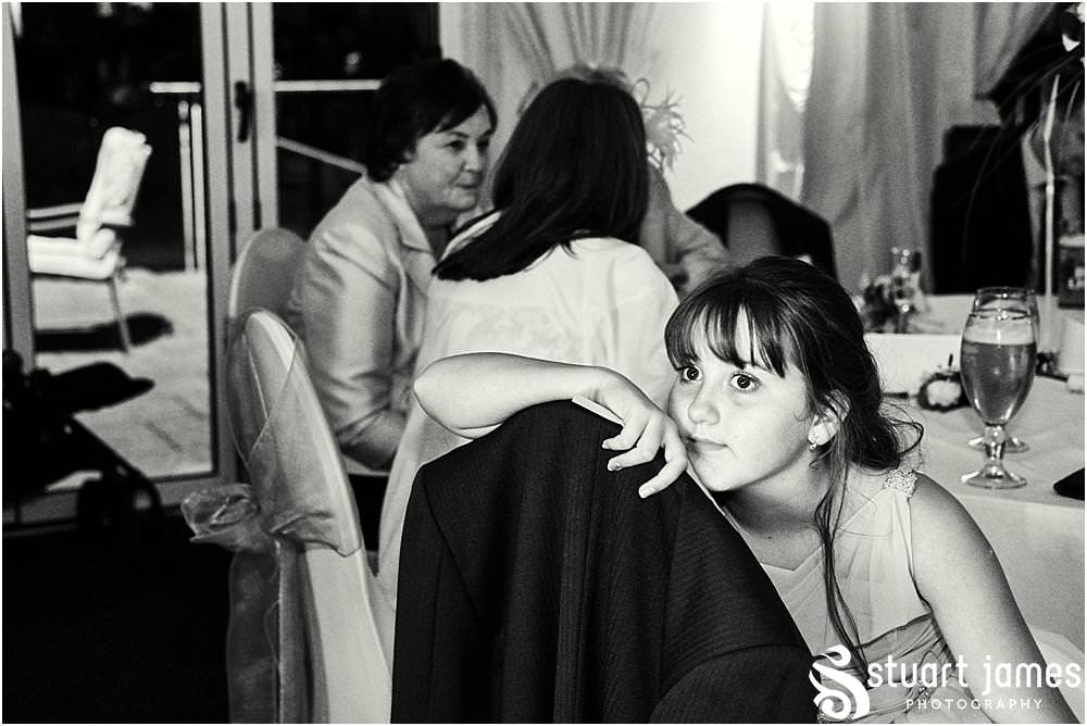 Candid photographs capturing the spirit and fun of the evening reception as the guests enjoy the fabulous wedding at Calderfields by Documentary Wedding Photographer Stuart James