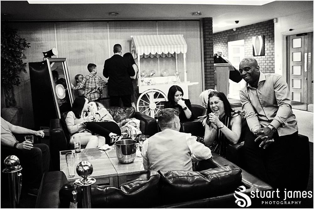 Photos that capture the guests having the most amazing time partying away on the dance floor at Calderfields by Documentary Wedding Photographer Stuart James
