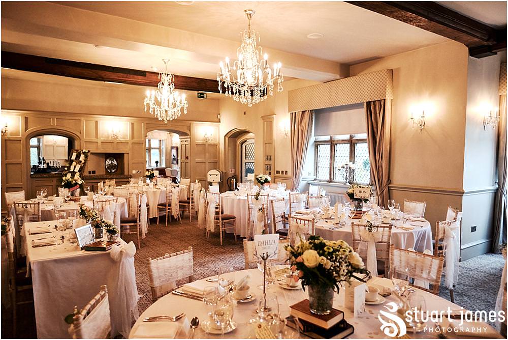 Beautifully decorated Westminster Suite for the wedding breakfast at Weston Hall in Stafford by Documentary Wedding Photographer Stuart James