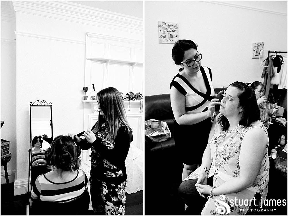 Finishing touches for the bride party before the wedding at Chester Zoo in Chester by Documentary Wedding Photographer Stuart James