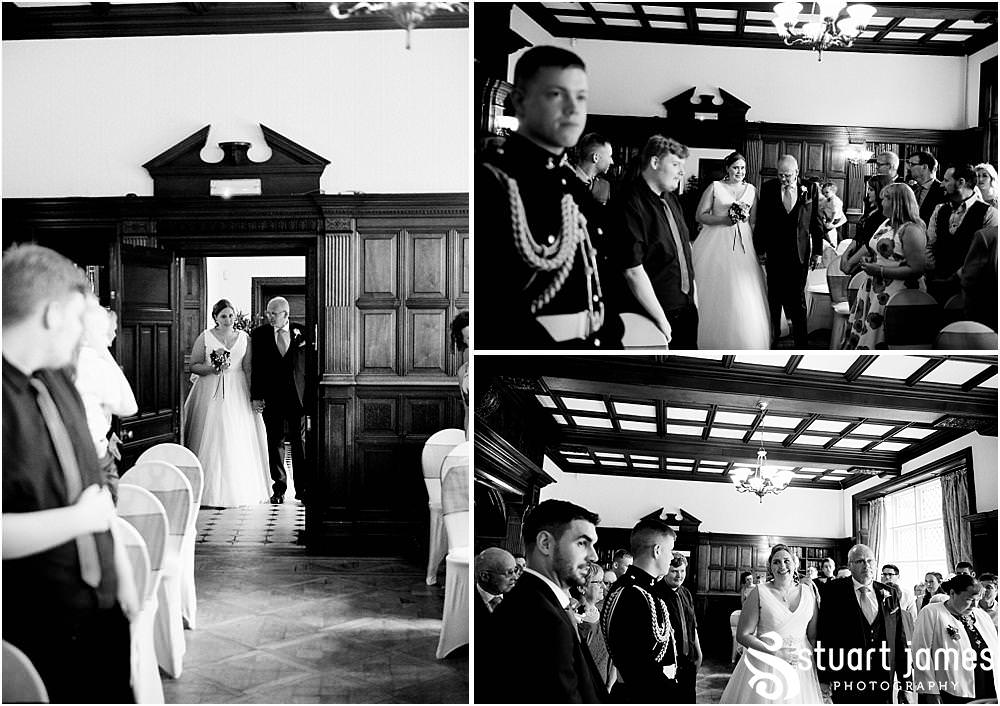 Capturing the entrance of the bridal party to the ceremony at Chester Zoo in Chester by Documentary Wedding Photographer Stuart James