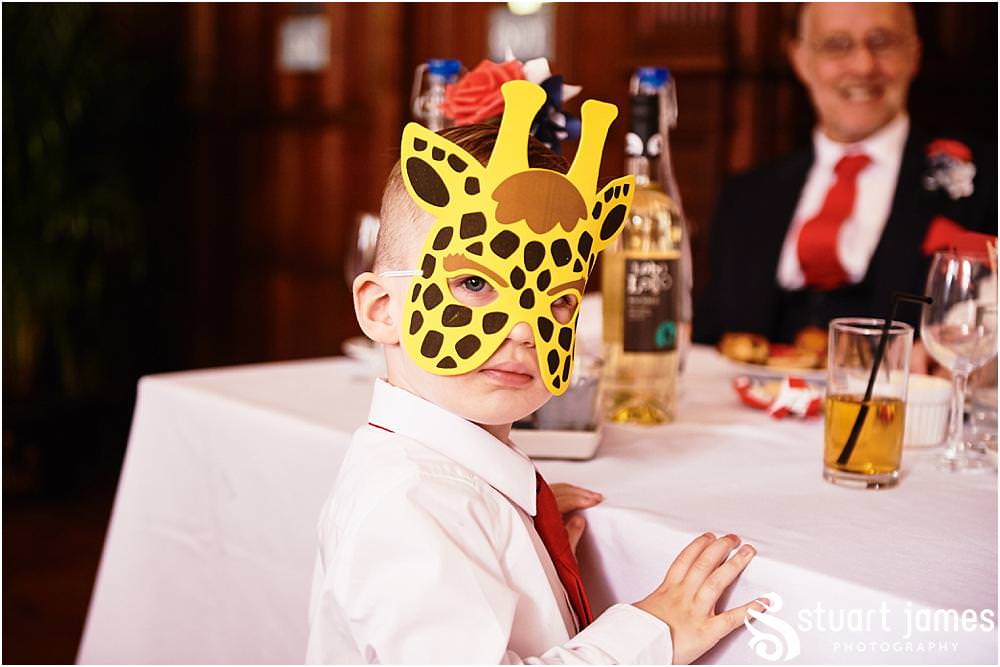 Creative photographs of the wedding speeches at Chester Zoo in Chester by Documentary Wedding Photographer Stuart James