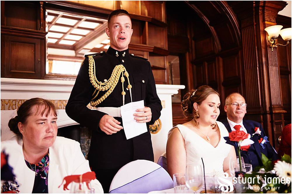 Creative photographs of the wedding speeches at Chester Zoo in Chester by Documentary Wedding Photographer Stuart James
