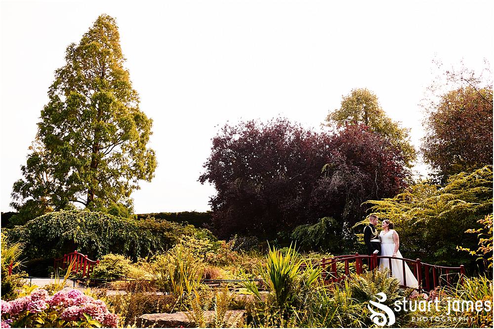 The most stunning setting in the grounds of Chester Zoo in Chester for bride and groom portraits on the wedding evening by Documentary Wedding Photographer Stuart James