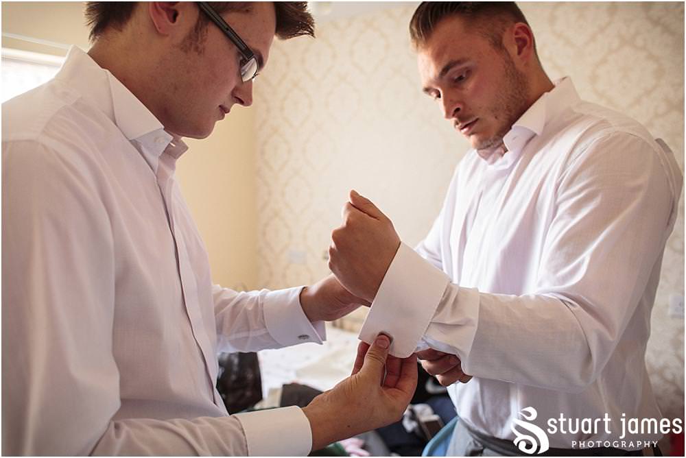 Creative reportage photographs of the groom and best man ahead of the wedding at Oak Farm in Cannock by Oak Farm Wedding Photographer Stuart James
