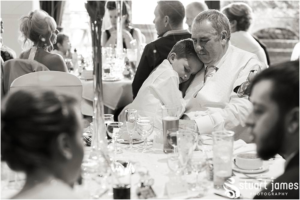 Relaxed candid photographs of the guests enjoying the wedding breakfast at Oak Farm in Cannock by Oak Farm Wedding Photographer Stuart James