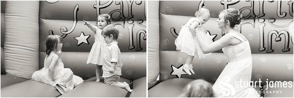Relaxed candid photographs capturing the guests enjoying the wedding reception in the gardens at Oak Farm in Cannock by Oak Farm Wedding Photographer Stuart James