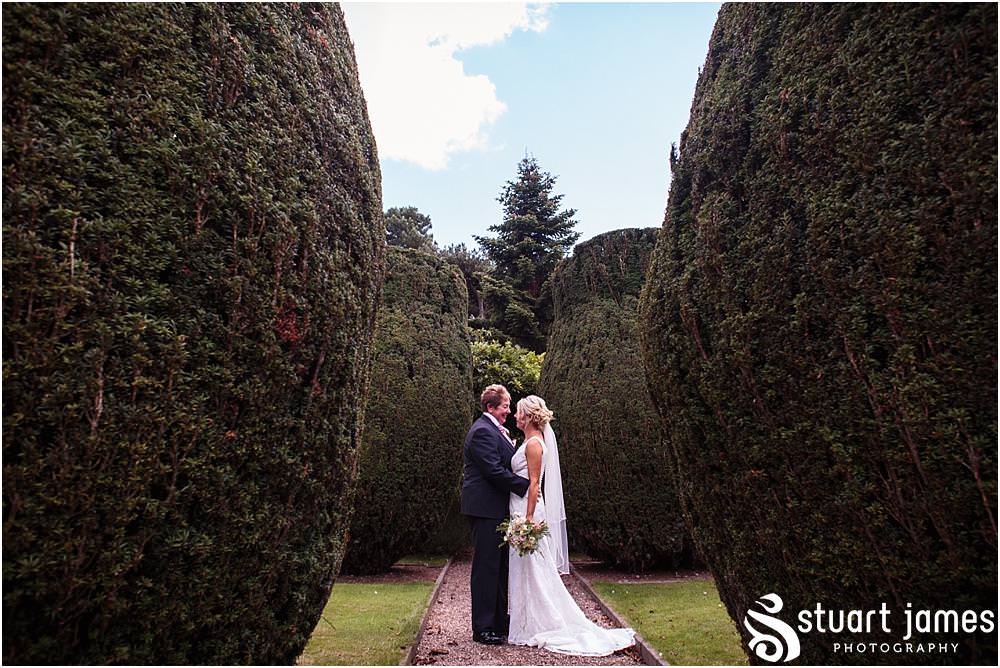 Creative natural portraits of the beautiful couple in the stunning gardens at Packington Moor Barn in Lichfield | Lichfield Barn Wedding Photographs by Documentary Wedding Photographer Stuart James