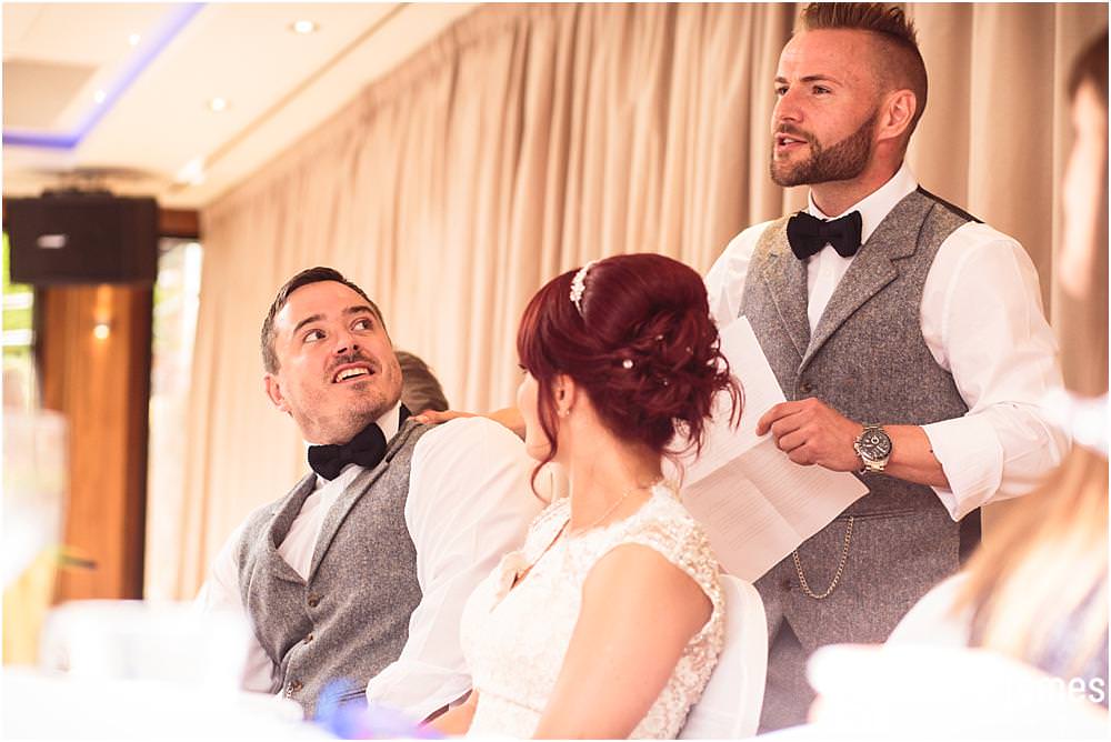 Creative documentary photographs of the wedding guests enjoying the reception at Moddershall Oaks captured by Moddershall Oaks Wedding Photographer Stuart James