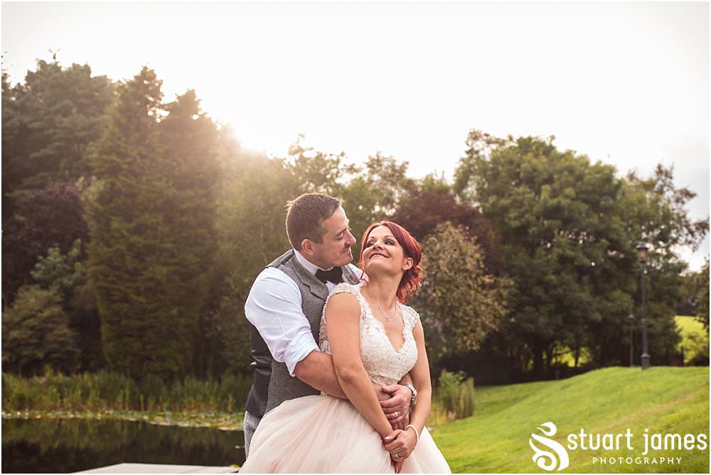 Creative evening portraits on the lakeside at Moddershall Oaks captured by Moddershall Oaks Wedding Photographer Stuart James