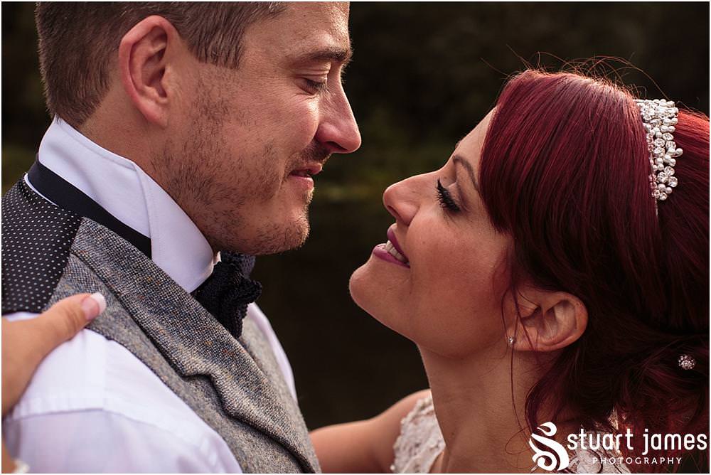 Creative evening portraits on the lakeside at Moddershall Oaks captured by Moddershall Oaks Wedding Photographer Stuart James
