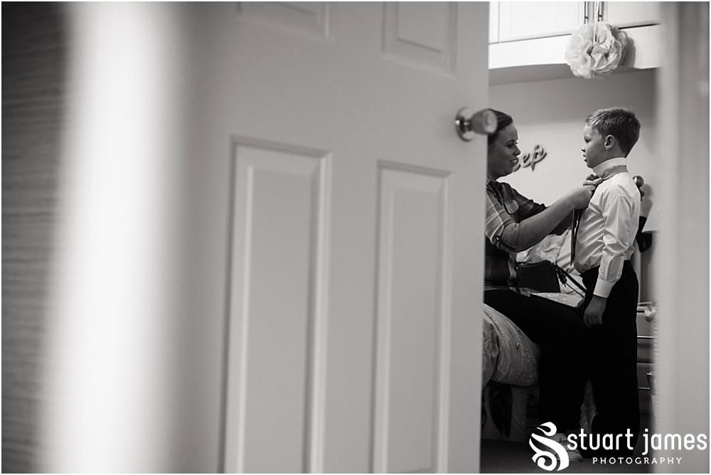 Capturing the excitement of the bridal morning preparations before the wedding at Middleton Church and Moxhull Hall in Sutton Coldfield by Moxhull Hall Wedding Photographers Stuart James