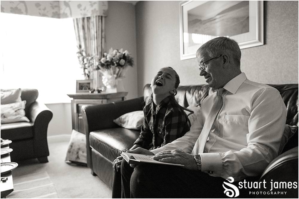 Capturing the excitement of the bridal morning preparations before the wedding at Middleton Church and Moxhull Hall in Sutton Coldfield by Moxhull Hall Wedding Photographers Stuart James