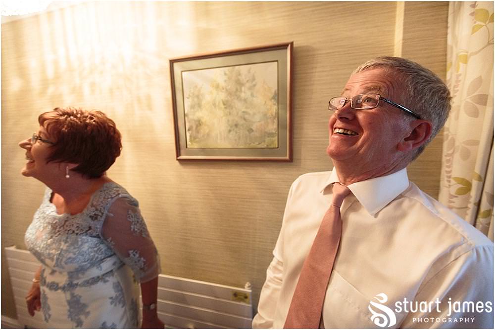 Capturing the excitement of the bridal morning preparations before the wedding at Middleton Church and Moxhull Hall in Sutton Coldfield by Moxhull Hall Wedding Photographers Stuart James