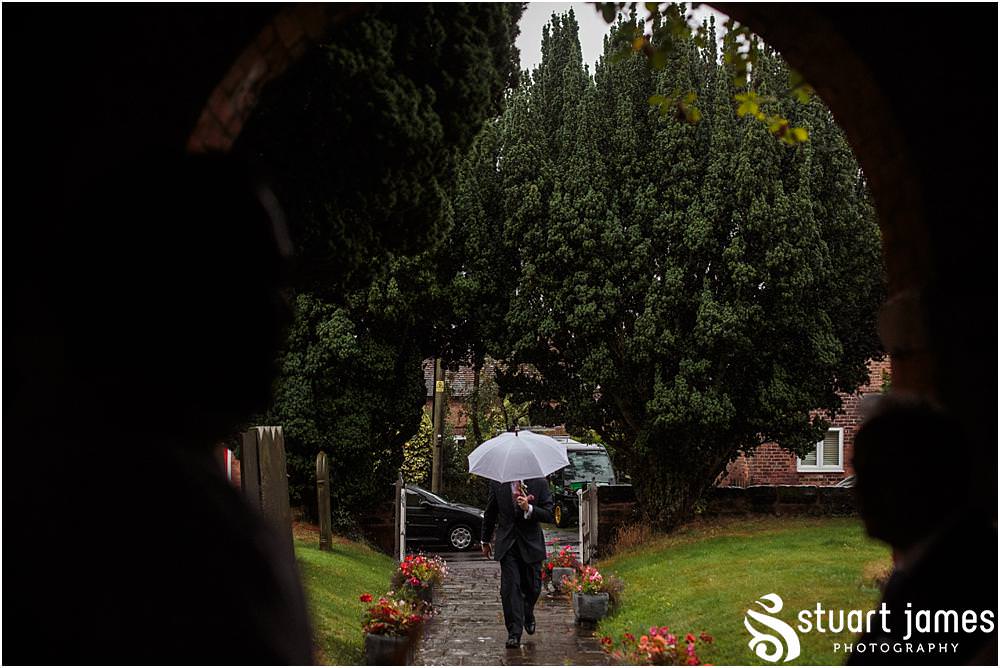 Capturing the arrival of the wedding guests for the wedding at Middleton Church and Moxhull Hall in Sutton Coldfield by Moxhull Hall Wedding Photographers Stuart James