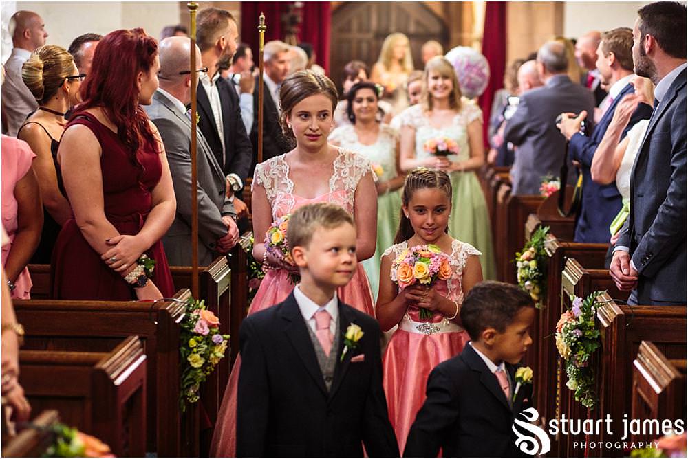 Such beautiful moments for the bridal party as they make their procession down the aisle at Middleton Church and Moxhull Hall in Sutton Coldfield by Moxhull Hall Wedding Photographers Stuart James