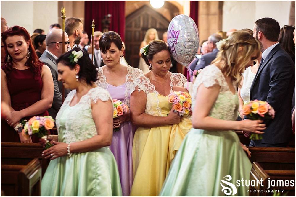 Such beautiful moments for the bridal party as they make their procession down the aisle at Middleton Church and Moxhull Hall in Sutton Coldfield by Moxhull Hall Wedding Photographers Stuart James