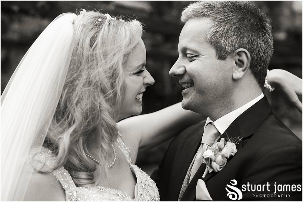 Creative natural portraits of the bride and groom in the stunning gardens at Moxhull Hall in Sutton Coldfield by Moxhull Hall Wedding Photographers Stuart James