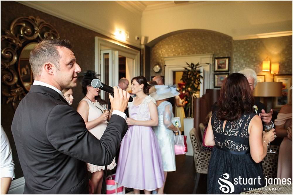 Capturing the guests enjoying the fabulous setting at Moxhull Hall in Sutton Coldfield by Moxhull Hall Wedding Photographers Stuart James