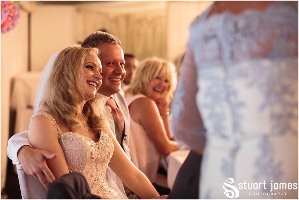Capturing the emotions and reactions as the guests enjoy the wedding speeches at Moxhull Hall in Sutton Coldfield by Moxhull Hall Wedding Photographers Stuart James