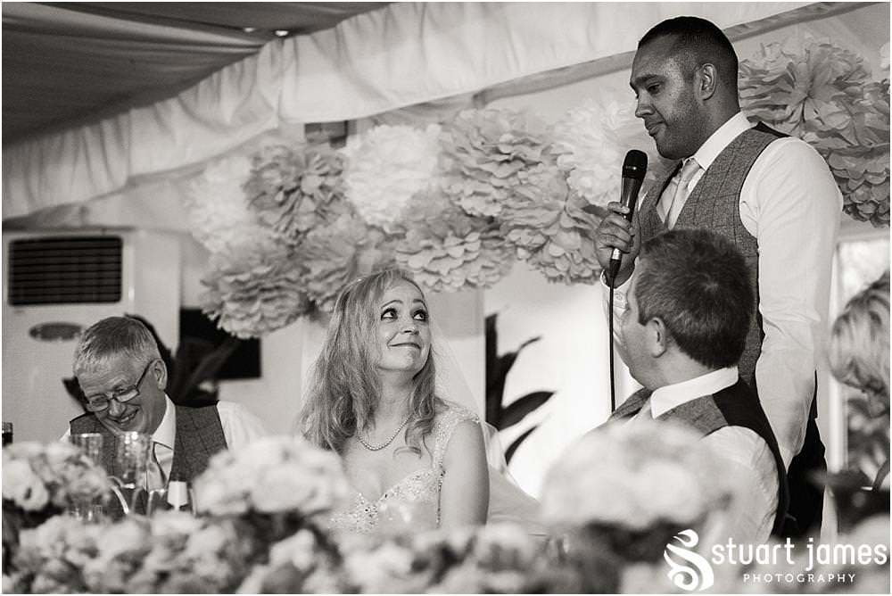 Capturing the speeches and the reactions of the guests with creative documentary photography at Moxhull Hall in Sutton Coldfield by Moxhull Hall Wedding Photographers Stuart James