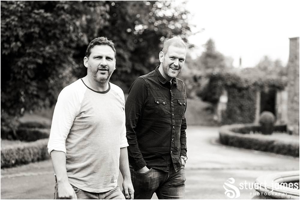 Creative candid photographs capturing the groomsmen preparations for the wedding at Pendrell Hall with Pendrell Hall Wedding Photography by Stuart James