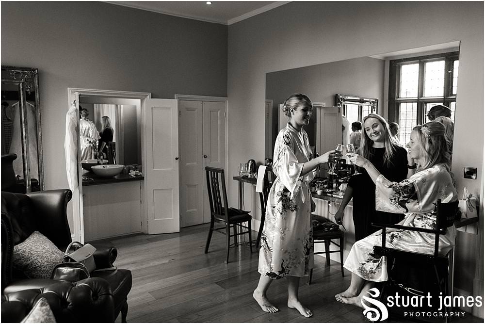 Unobtrusive photos that really show the mood and excitement of the wedding morning for the bridal party in Love is Enough at Pendrell Hall with Pendrell Hall Wedding Photography by Stuart James