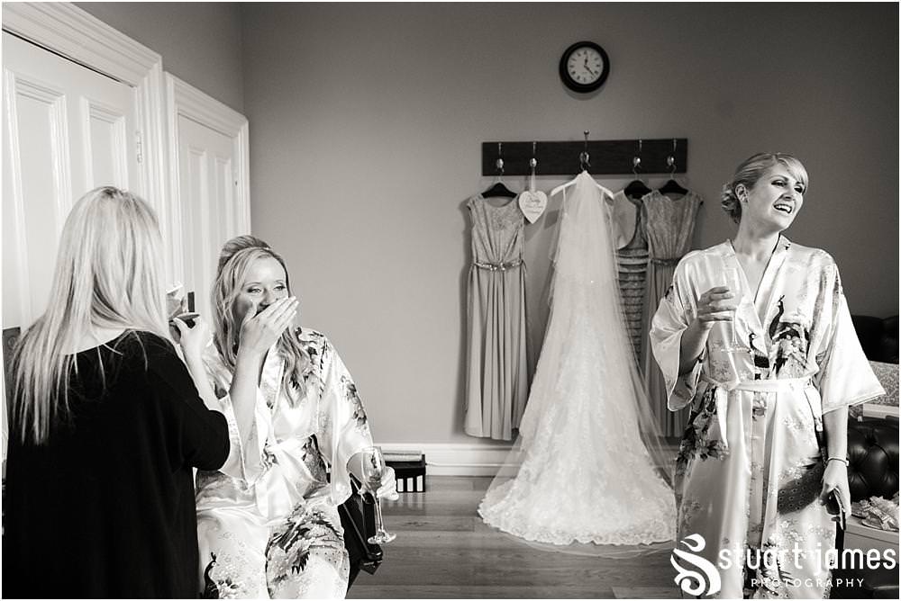 Unobtrusive photos that really show the mood and excitement of the wedding morning for the bridal party in Love is Enough at Pendrell Hall with Pendrell Hall Wedding Photography by Stuart James