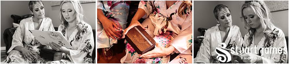 Gift time always brings amazing emotions to capture with the bridal party at Pendrell Hall with Pendrell Hall Wedding Photography by Stuart James