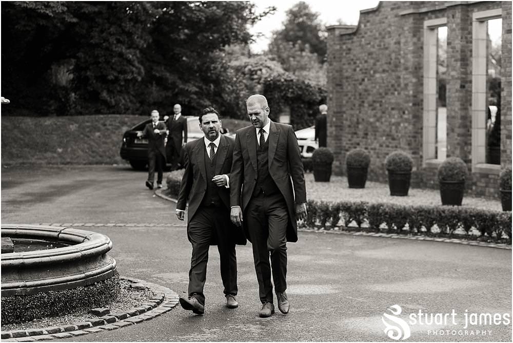 Capturing our groom heading to greet the guests arriving for the wedding at Pendrell Hall with Pendrell Hall Wedding Photography by Stuart James