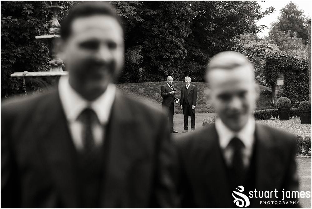 Capturing our groom heading to greet the guests arriving for the wedding at Pendrell Hall with Pendrell Hall Wedding Photography by Stuart James
