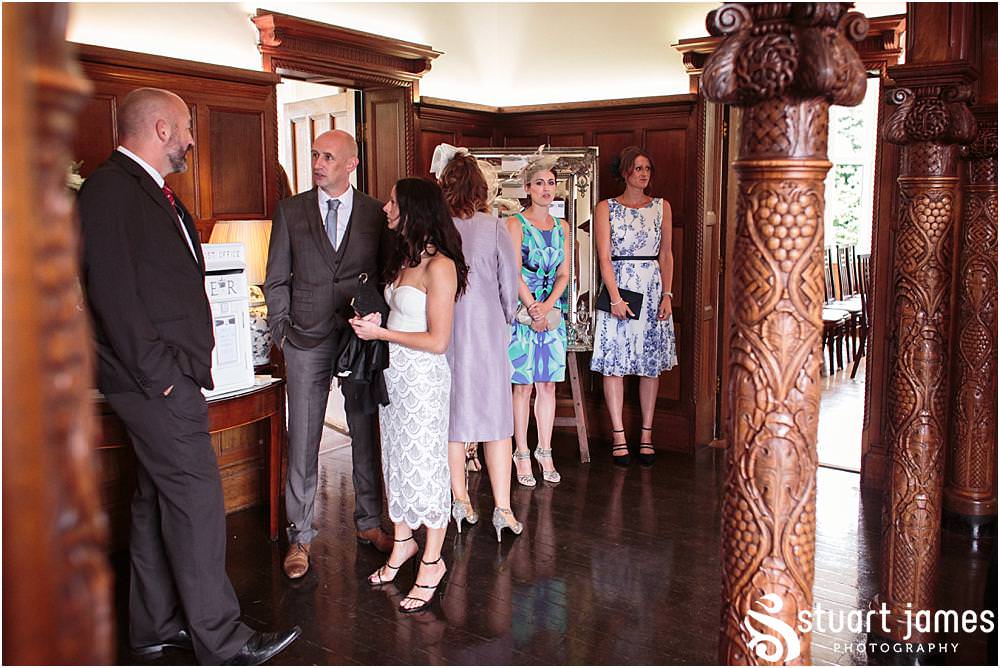 Capturing the arrival of the wedding guests excited for the fabulous day at Pendrell Hall with Pendrell Hall Wedding Photography by Stuart James