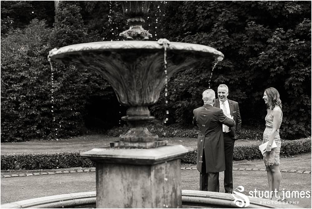 Capturing the arrival of the wedding guests excited for the fabulous day at Pendrell Hall with Pendrell Hall Wedding Photography by Stuart James