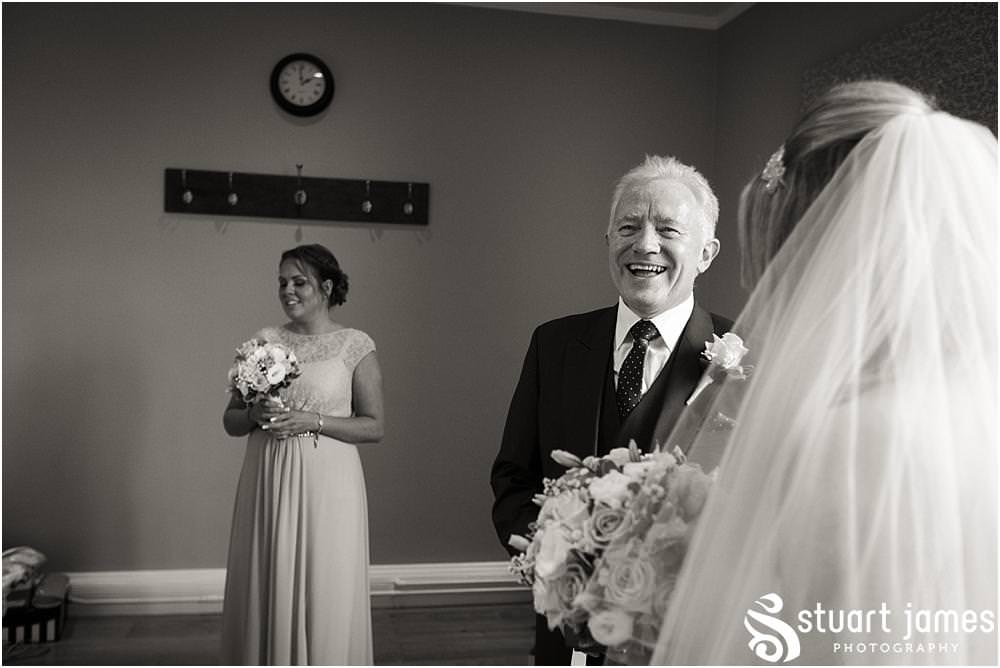 A truly stunning and memorable moment as the Father of the Bride sees his daughter as a bride for the first time at Pendrell Hall with Pendrell Hall Wedding Photography by Stuart James