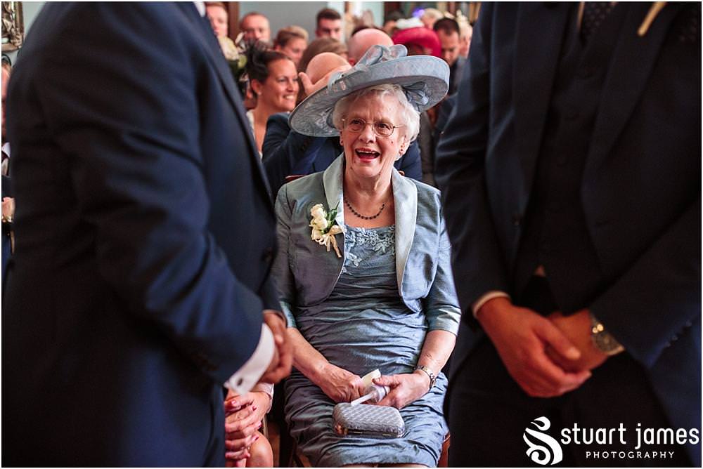 Capturing the beautiful and emotional ceremony in unobtrusive photographs at Pendrell Hall with Pendrell Hall Wedding Photography by Stuart James