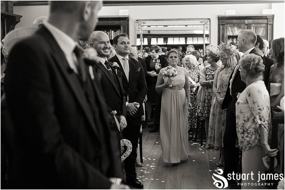 Capturing the beautiful and emotional ceremony in unobtrusive photographs at Pendrell Hall with Pendrell Hall Wedding Photography by Stuart James
