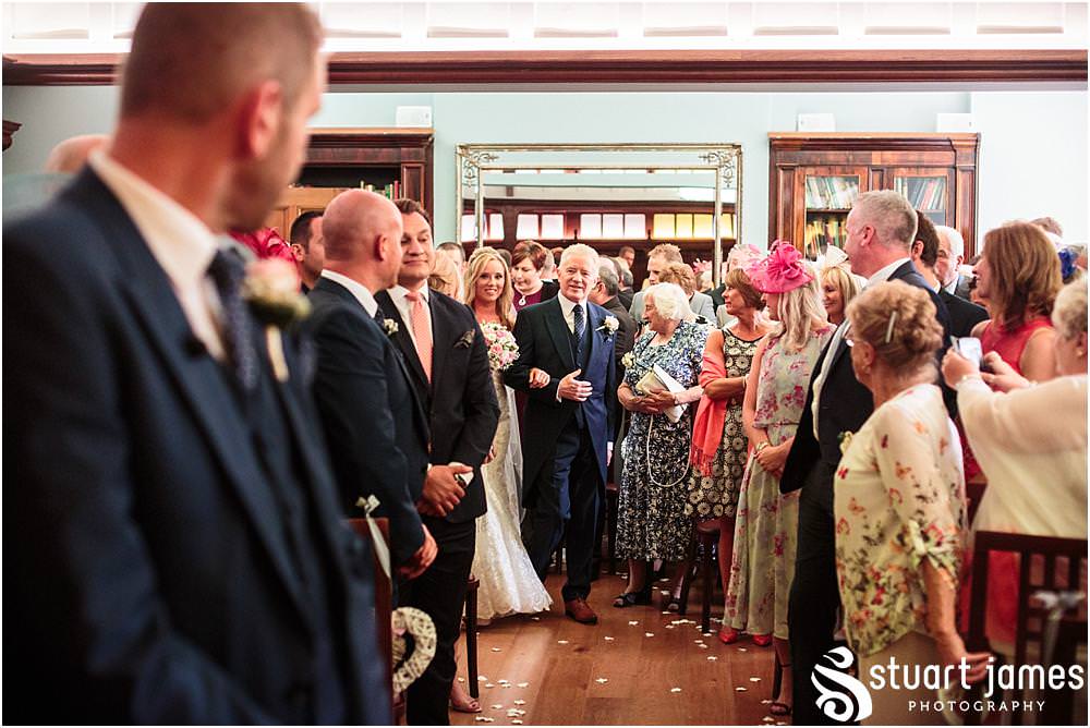 Capturing the beautiful and emotional ceremony in unobtrusive photographs at Pendrell Hall with Pendrell Hall Wedding Photography by Stuart James