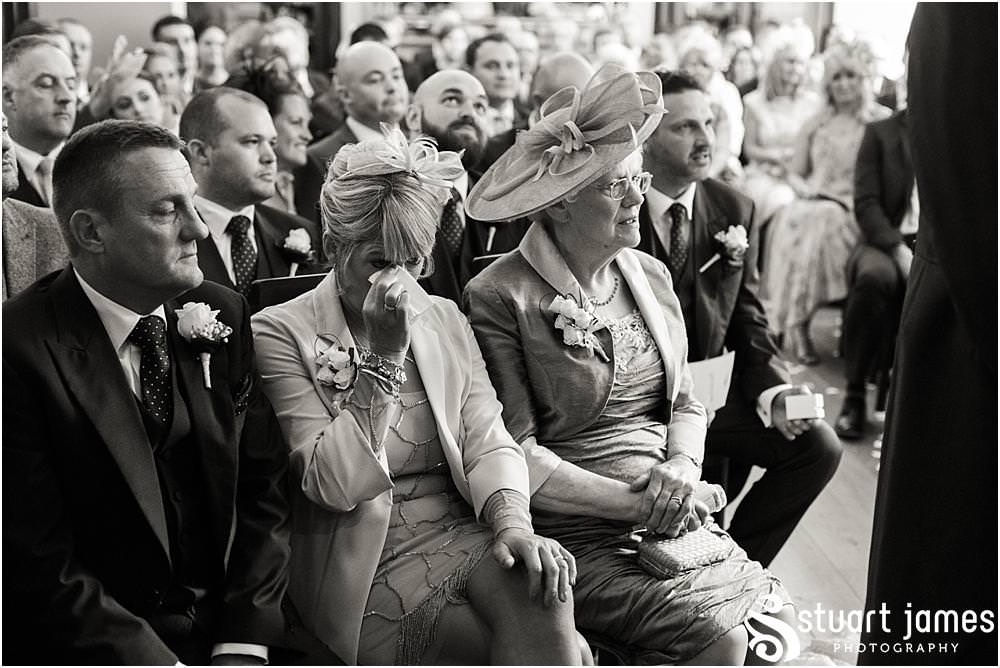 Capturing the beautiful and emotional ceremony in unobtrusive photographs at Pendrell Hall with Pendrell Hall Wedding Photography by Stuart James
