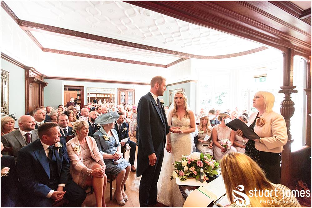 Capturing the beautiful and emotional ceremony in unobtrusive photographs at Pendrell Hall with Pendrell Hall Wedding Photography by Stuart James