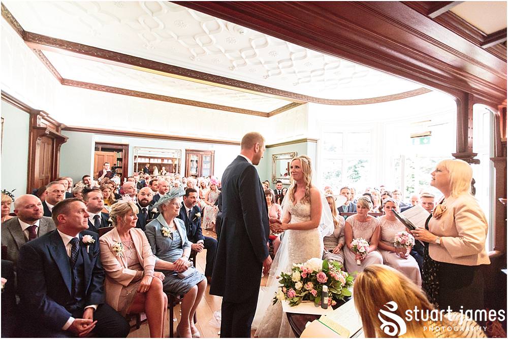 Capturing the beautiful and emotional ceremony in unobtrusive photographs at Pendrell Hall with Pendrell Hall Wedding Photography by Stuart James