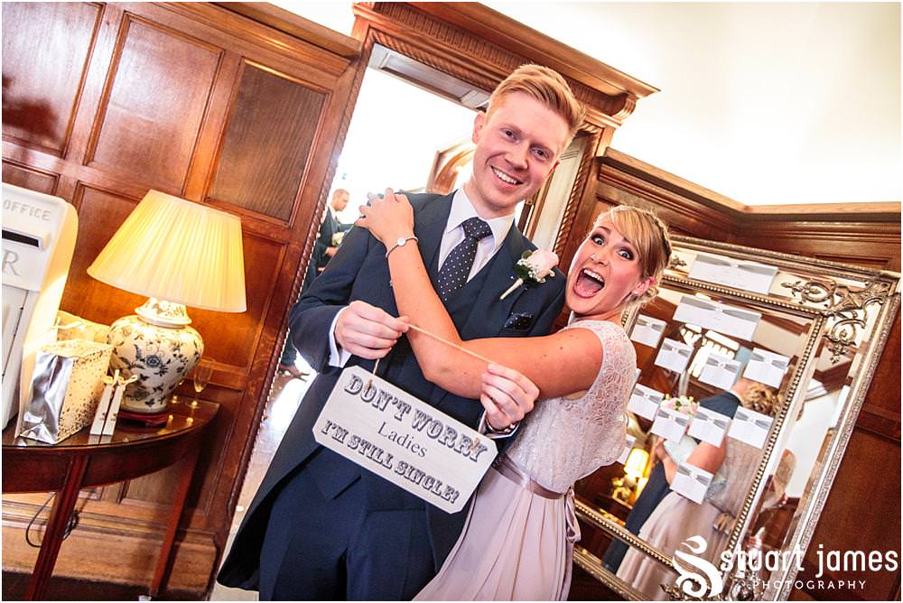 Creative candid photographs capturing the guests enjoying the drinks reception on the lawns at Pendrell Hall with Pendrell Hall Wedding Photography by Stuart James