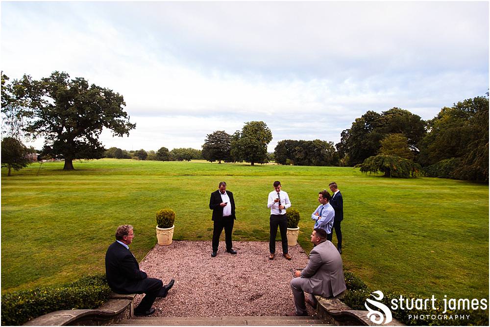 Capturing the fun of the wedding evening as the guests arrive ready to party with the new Mr & Mrs at Pendrell Hall with Pendrell Hall Wedding Photography by Stuart James