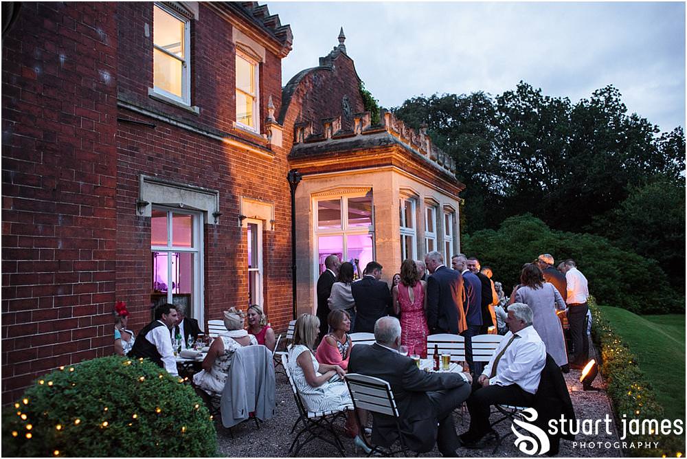 Capturing the fun of the wedding evening as the guests arrive ready to party with the new Mr & Mrs at Pendrell Hall with Pendrell Hall Wedding Photography by Stuart James