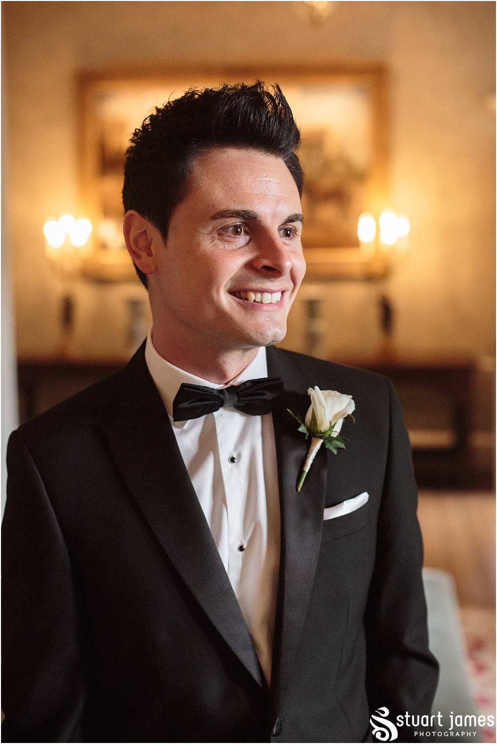 Creative relaxed photographs of the groomsmen preparations ahead of the wedding at Weston Park in Shropshire by Shropshire Wedding Photographer Stuart James